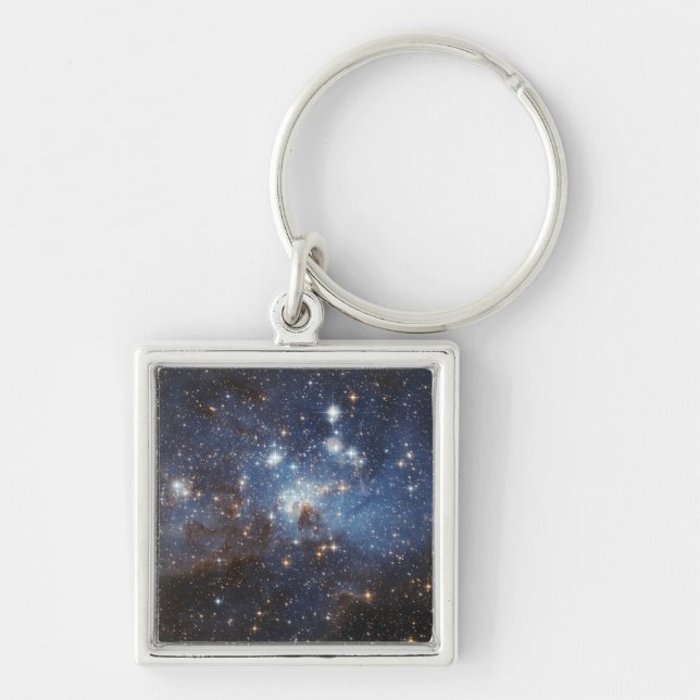 Swirls of gas and dust keychain (Front)