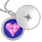Swirly Pink Heart Necklace on Blue Background