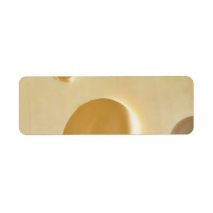 SWISS CHEESE SURFACE TEXTURE CREAM CIRCLES HOLES LABEL