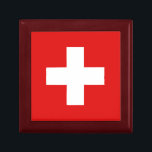 Switzerland Flag Gift Box<br><div class="desc">The ceramic lid of this keepsake box features the Swiss flag reshaped to fit the square surface. This item is both decorative and useful and is the perfect place to keep small mementos of Switzerland.</div>
