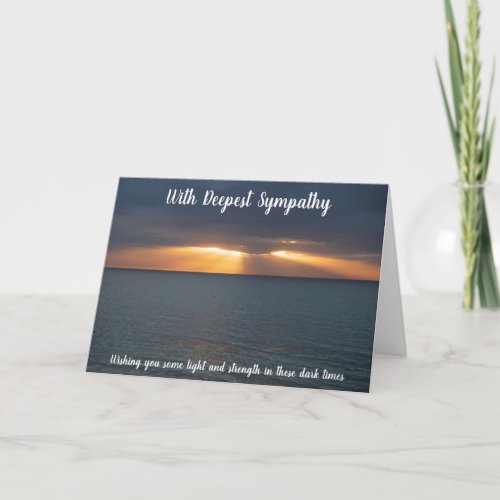 Sympathy sunset over the sea light in dark times card