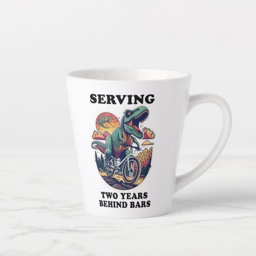 T_rex SERVING Two Years Behind Bars Latte Mug