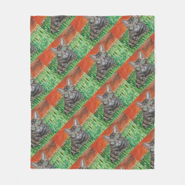 Tabby cat looking curious in grass fleece blanket  (Front)
