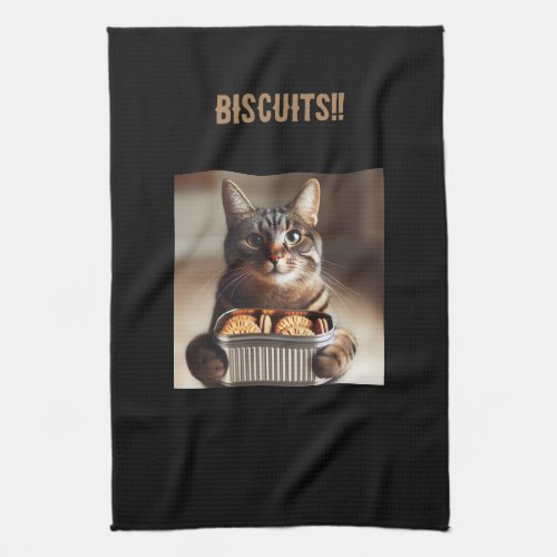 Tabby cat presenting a tin of biscuits kitchen towel