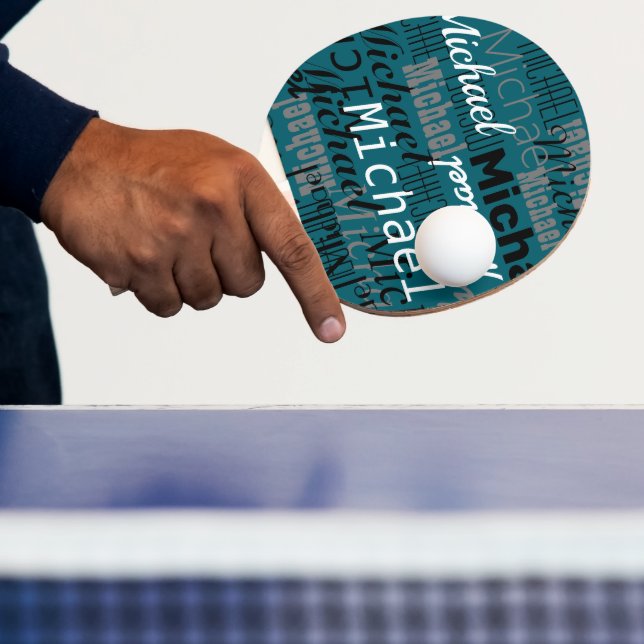 Table-Tennis Player Name repeated on dark teal Ping Pong Paddle (Insitu)