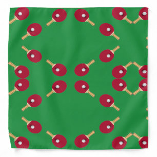 Table tennis racket and ball on green bandana