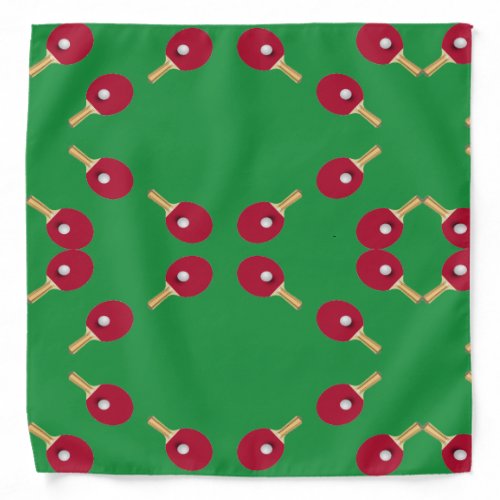 Table tennis racket and ball on green bandana