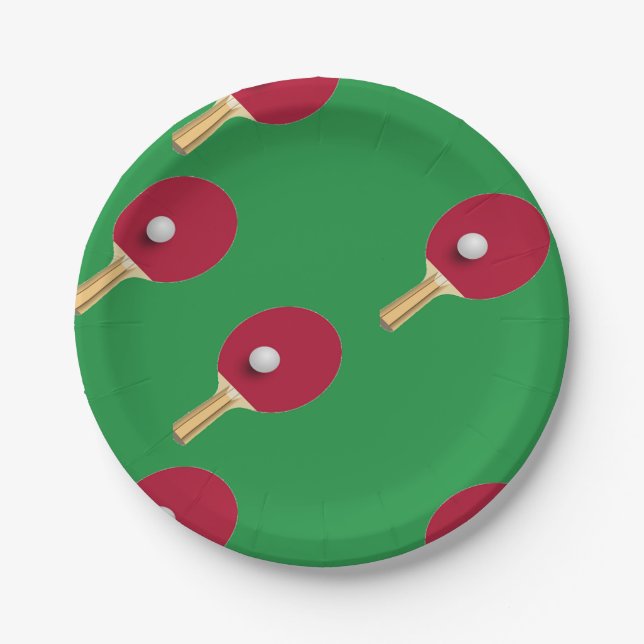 Table tennis racket and ball on green paper plates (Front)