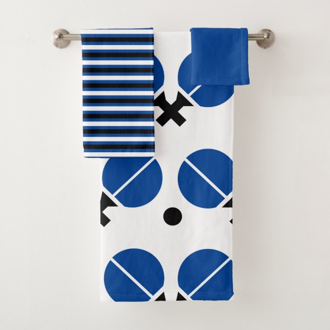 Table tennis rackets and ball in black, blue bath towel set (Insitu)