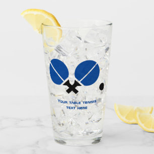 Table tennis rackets and ball in black, blue glass