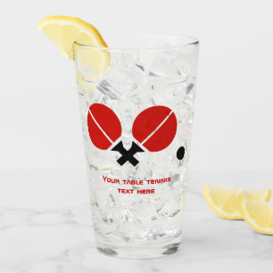 Table tennis rackets and ball in black, red glass