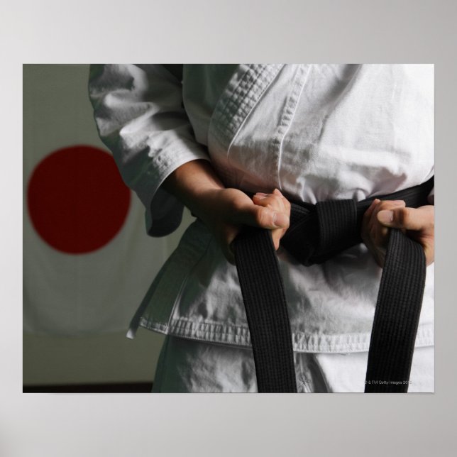 Taekwondo Fighter Tightening Belt Poster (Front)
