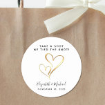 Take A Shot We Tied The Knot Wedding Favor Classic Round Sticker<br><div class="desc">Custom sticker for wedding drink favors with two gold hearts together in the middle. You can personalize "Take a Shot,  We Tied the Knot" to something similar in length. Add your first names and wedding date below.</div>