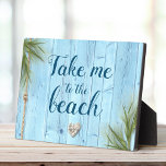 Take Me to Beach Rustic Light Blue Coastal Wood Plaque<br><div class="desc">Keep your summer memories close to your heart all year long with this beachy light blue wood with nautical rope, coral heart, and coastal sea grass easel back plaque. Place in your workspace and get ready to be transported back to your fondest happy place. Great for daily inspiration! You can...</div>