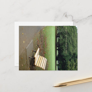 Taking a short break on a park bench. postcard