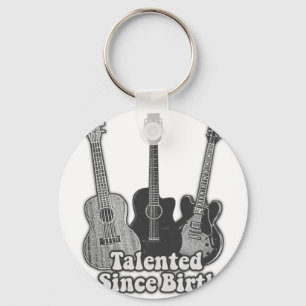 Talented since birth. vintage black & white guitar keychain