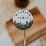 Tall Pines | Personalized Wedding Classic Round Sticker<br><div class="desc">Rustic chic stickers for your outdoor,  woods or adventurous wedding feature a forest of hunter green pine trees with your name and wedding date in block lettering.</div>