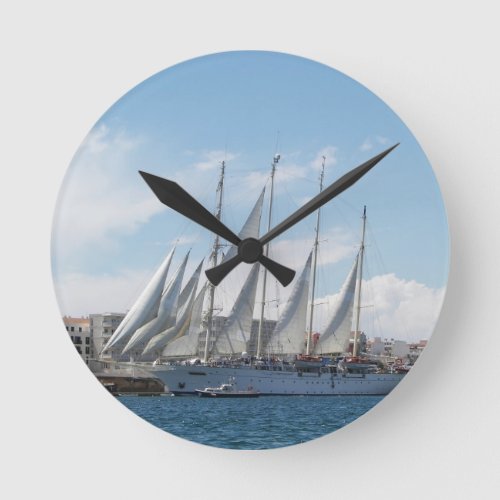 Tall Ship Sailing Out Of Harbor Round Clock