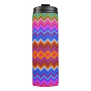 Tall travel mug with a vibrant zigzag pattern
