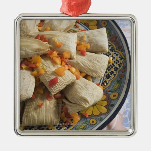 Tamales on decorative plate metal ornament