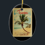Tampa Palm Tree Vintage Travel Ceramic Ornament<br><div class="desc">A uniquely retro mid-century modern Tampa Florida art print in vintage travel poster style. It features a curved palm tree on sandy beach with ocean under a blue cloudy sky.</div>