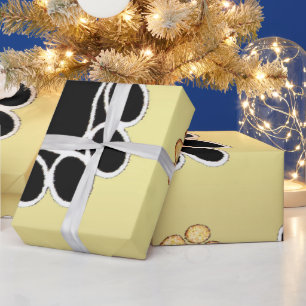 Tan and black paw print on a gold background #1 wrapping paper