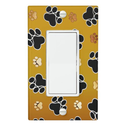 Tan and black paw print on a gold background 2 light switch cover