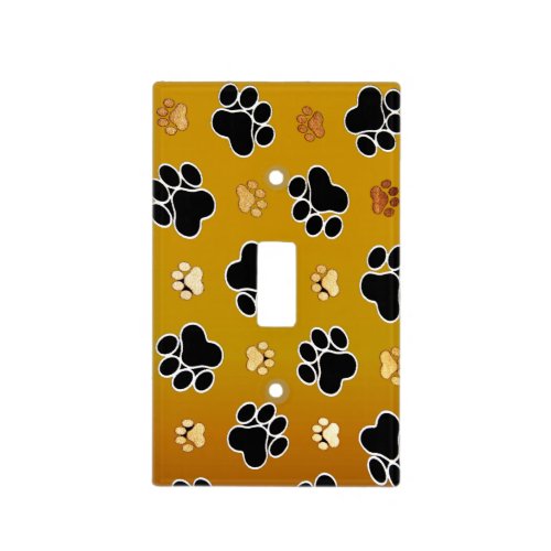 Tan and black paw print on a gold background 2 light switch cover