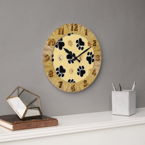 Tan and black paw print on a gold background 3 large clock
