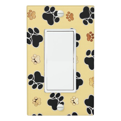 Tan and black paw print on a gold background 3 light switch cover