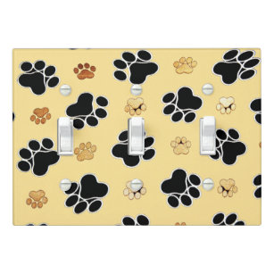 Tan and black paw print on a gold background #3 light switch cover