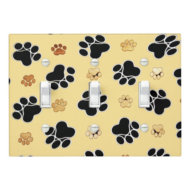 Tan and black paw print on a gold background #3 light switch cover (In Situ)
