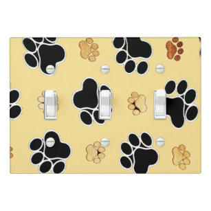 Tan and black paw print on a gold background #3 light switch cover