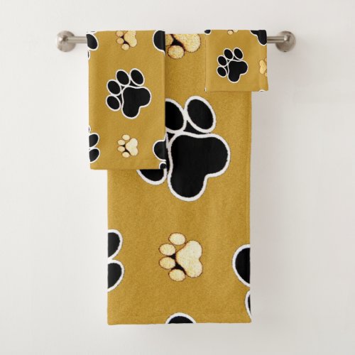 Tan and black paw print on a gold background 4 bath towel set