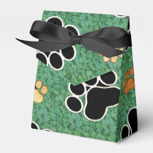 Tan and black paw print on green grass favor boxes