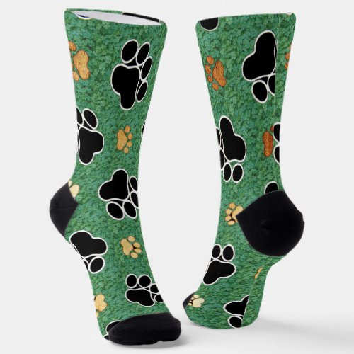 Tan and black paw print on green grass  socks