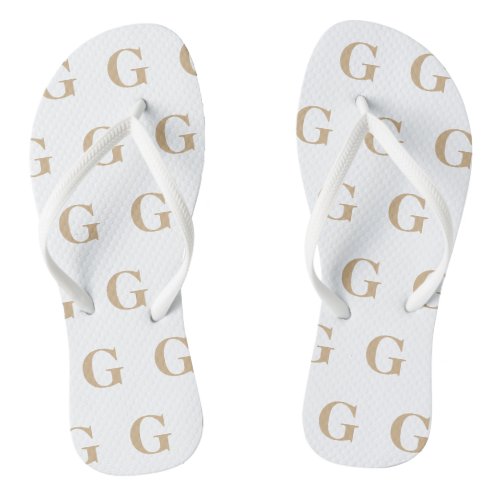 Tan and White Monogram Pattern Flip Flops