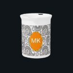 Tangerine Black Paisley Drink Pitcher<br><div class="desc">Tangerine orange accents on this black and white paisley - We have left all of the images used in this design customizable - You can play with them to your hearts content- Click the orange 'Customize This' button and highlight the image you want to remove, resize or rotate- have fun...</div>