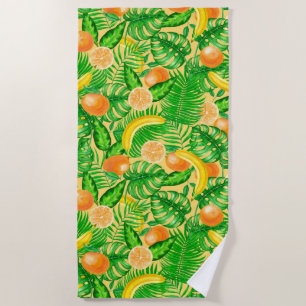 Tangerines, bananas and tropical leaves beach towel