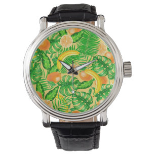 Tangerines, bananas and tropical leaves watch