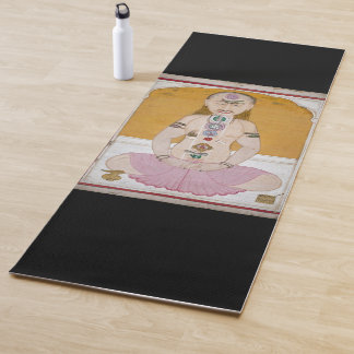 Tantric yogi showing chakras and kundalini yoga mat
