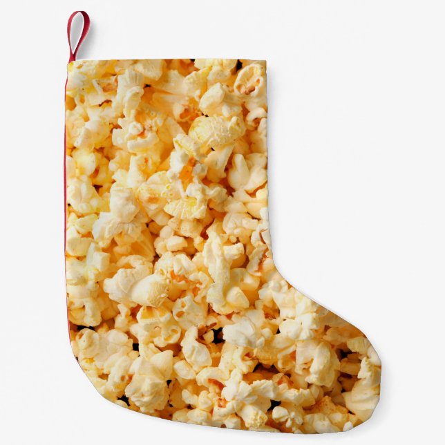 Tasty popcorn on whole background. Food  Small Christmas Stocking (Front)