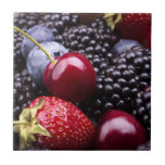 Tasty Summer Fruits On A Wooden Table Tile<br><div class="desc">tasty summer fruits on a wooden table. Cherry Blue berries strawberry raspberries Blackberries pomegranate © and ® Bigstock® - All Rights Reserved.</div>