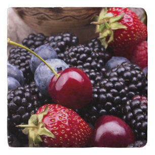 Tasty Summer Fruits On A Wooden Table Trivet
