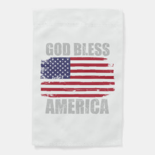 Tattered flag with "God Bless America"