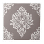 Taupe and Cream Damask Ceramic Tile<br><div class="desc">A light taupe damask pattern on a darker taupe background creates this striking ceramic tile design. Beautiful for a kitchen backsplash,  bathroom tub,  shower and countertop tile,  or any area (not for outdoor use.) MATCHING items in our store.</div>