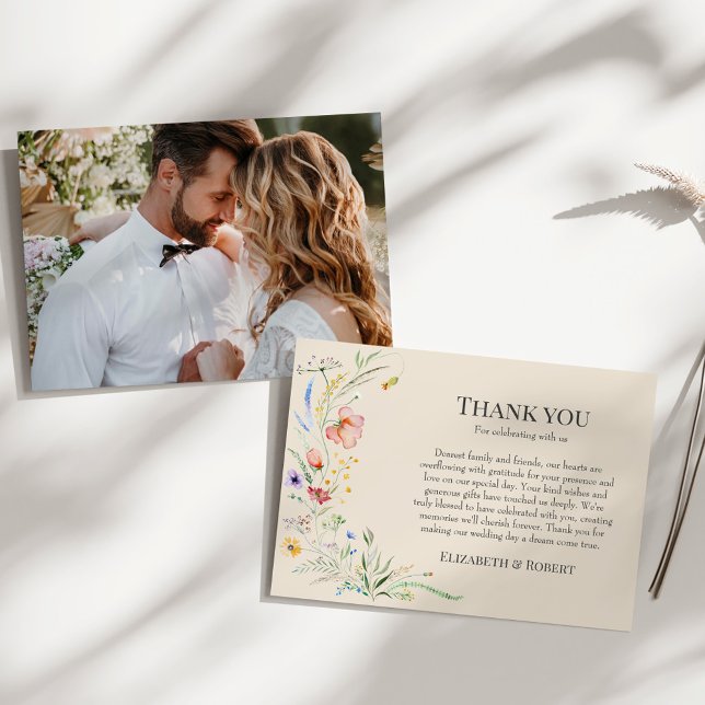 Taupe Wildflower Meadow Couple Photo Wedding Thank You Card (Taupe Wildflower Meadow Couple Photo Wedding Thank You Card on a sunny white table.)