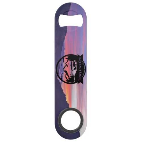 TCC sunsets  logo bottle opening Bar Key