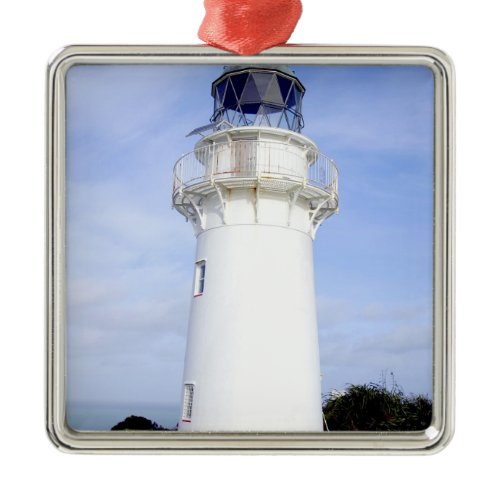 Te Araroa, New Zealand. A lighthouse gives Metal Ornament