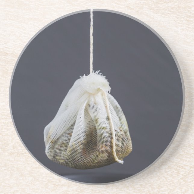 Tea bag is hung in a cup drink coaster (Front)